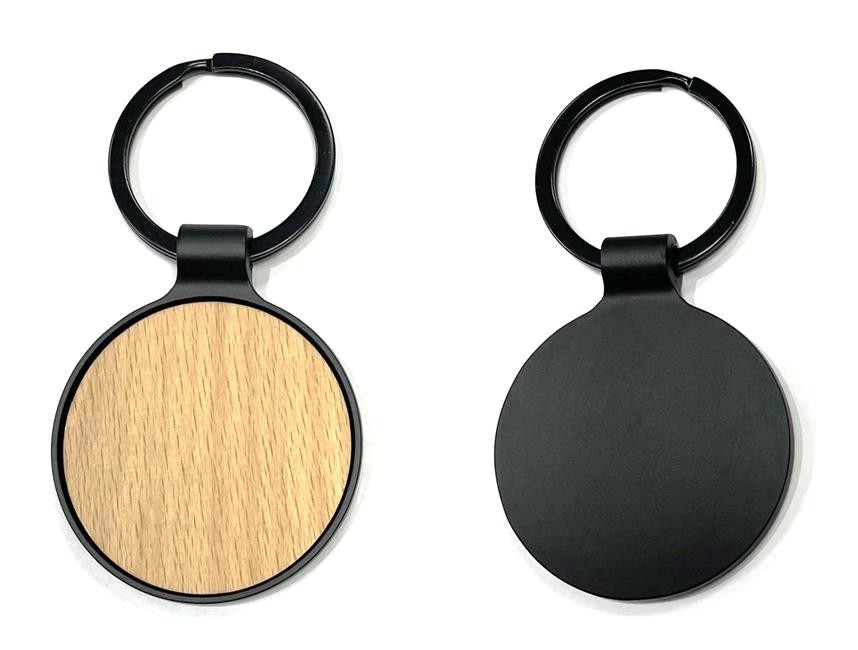 Porte clé rond en bois avec anneau et contour métal noir