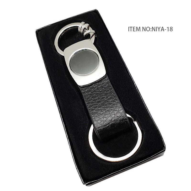 Porte clés simili laitonné torsade noir