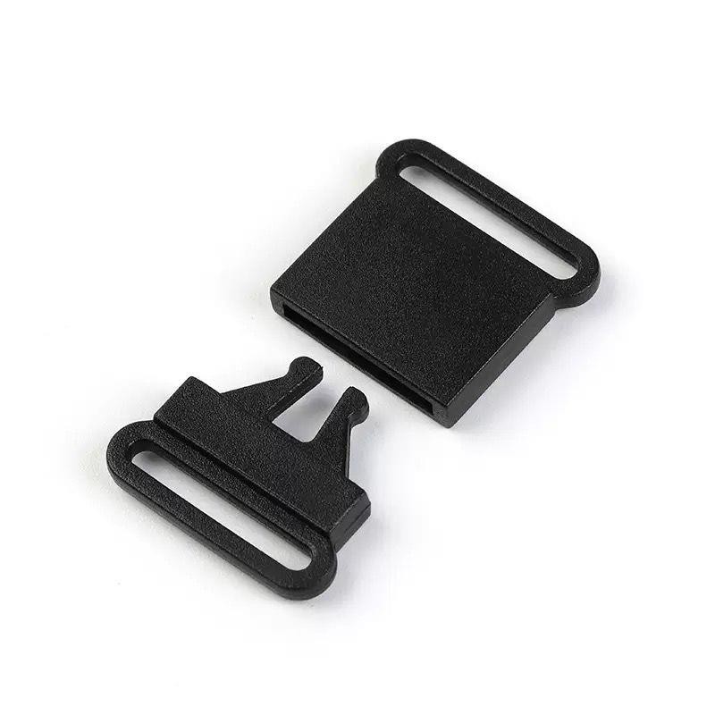 Crochet en plastique systeme de securité noir pour ficelle 2cm